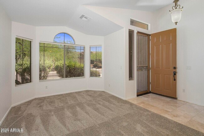 Building Photo - 10307 E Caribbean Ln