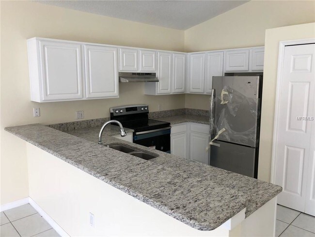 Granite counters all new appliances - 1014 Universal Rest Pl