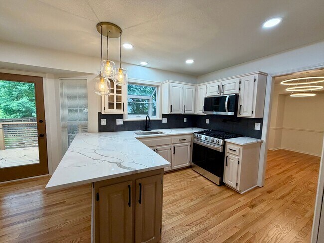 Building Photo - {14776} Fully Remodeled Two Story + Finished Basement + Fenced Yard