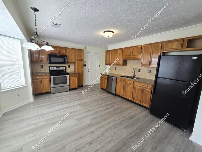 Building Photo - 7064 Grinder Ct