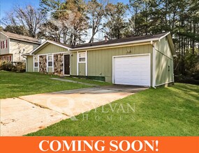 Building Photo - The living is easy in this 3 bedroom, 2 bathroom home