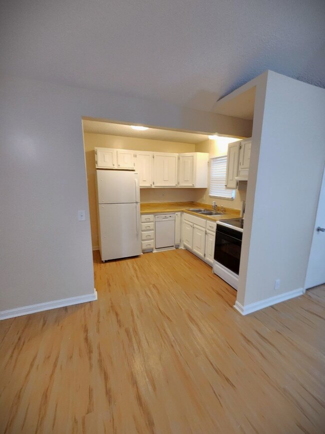 Kitchen with new fridge and new dishwater! - 304 Myrick Dr