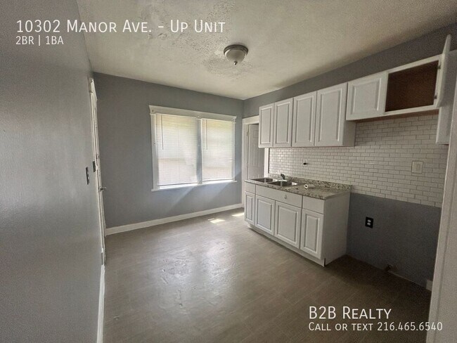 Building Photo - 10302 Manor Ave