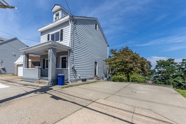 Building Photo - Available NOW  - Updated South Side Slopes Gem | Private Decks + Off-Street Parking