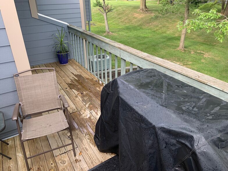 Back deck with two different sliding door access points - 197 Sugarwood Ln