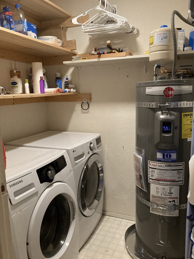 Laundry room with full-size front load washer and dryer. Brand new water heater. - 6 Lake Bellevue Dr