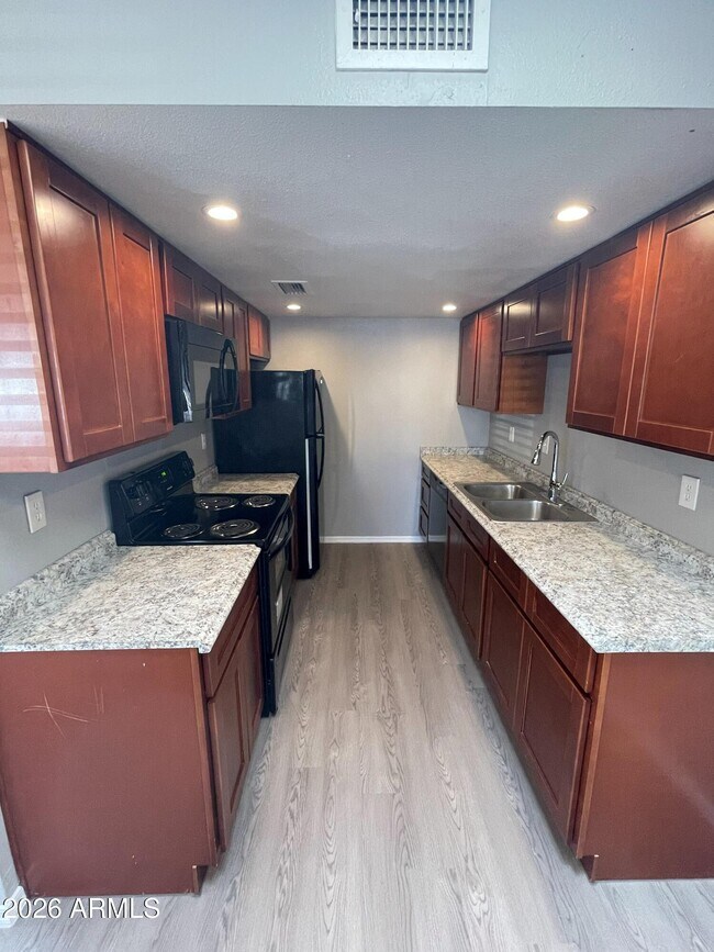 Building Photo - 6541 N 67th Ave