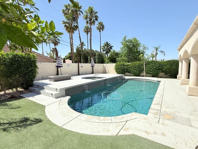 Building Photo - Spacious 4-Bedroom Home with Pool & Spa in...