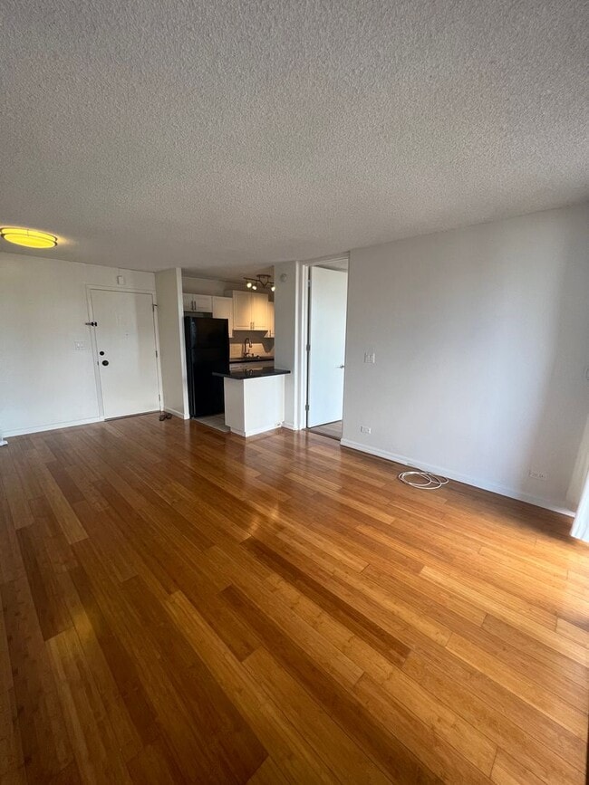 Building Photo - A/C. Ocean/City view. Covered Lanai. Swimm...