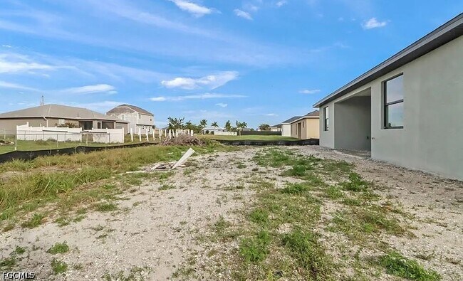 Building Photo - 408 Chiquita Blvd N