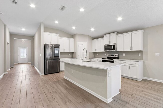 Building Photo - Modern 4BR Home with 3 Full Baths in River Glen | Screened Porch & Resort-Style Amenities