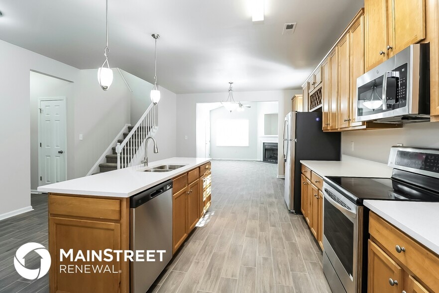 Building Photo - 6673 Thistle Down Dr