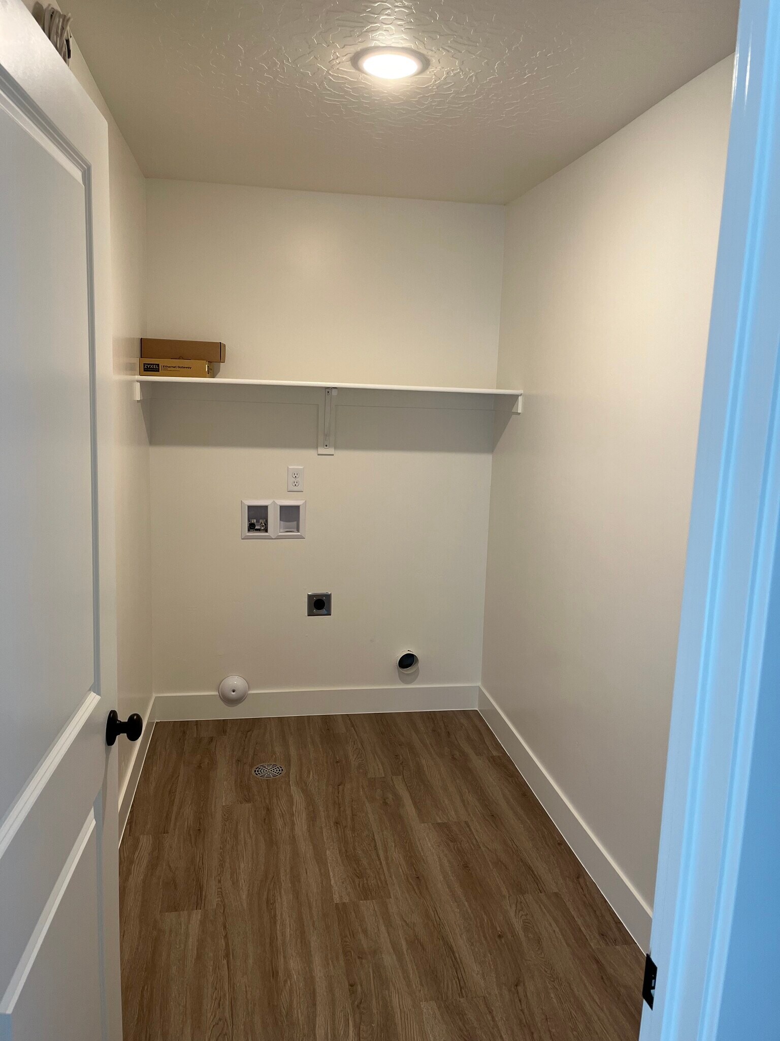 Upstairs laundry room - 5643 S Duel Ln