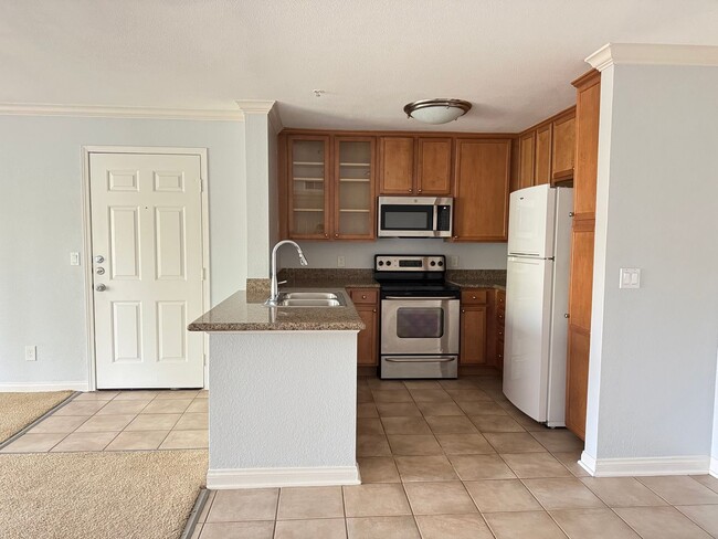 Building Photo - Magnificent 1 Bedroom Condo in Triana in Corona Ranch
