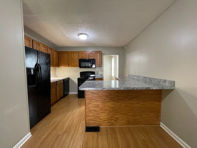 Building Photo - Where the city is your backyard! First Mon...