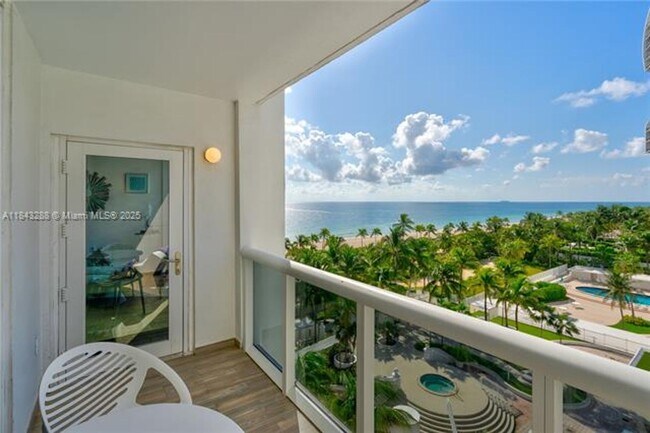 Building Photo - 10275 Collins Ave