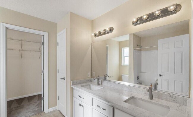 Building Photo - 4995 N Tasman Dr