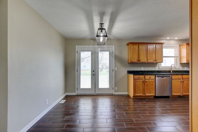 Building Photo - Four Bedroom with Bonus Room and a detache...