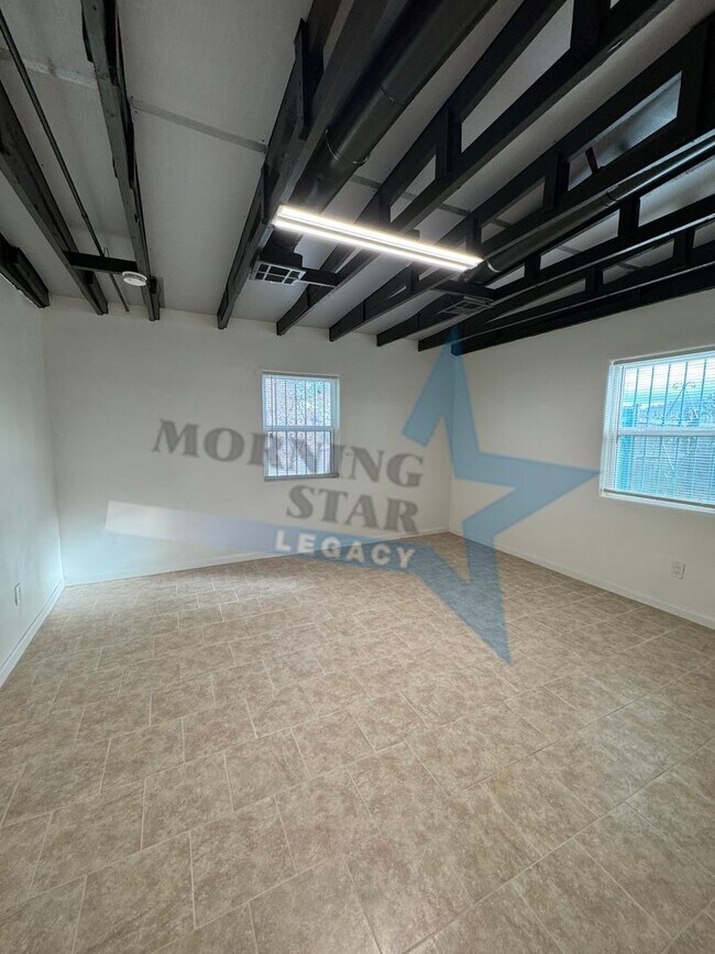 Building Photo - Charming Updated Home w/ Enclosed Yard & Storage