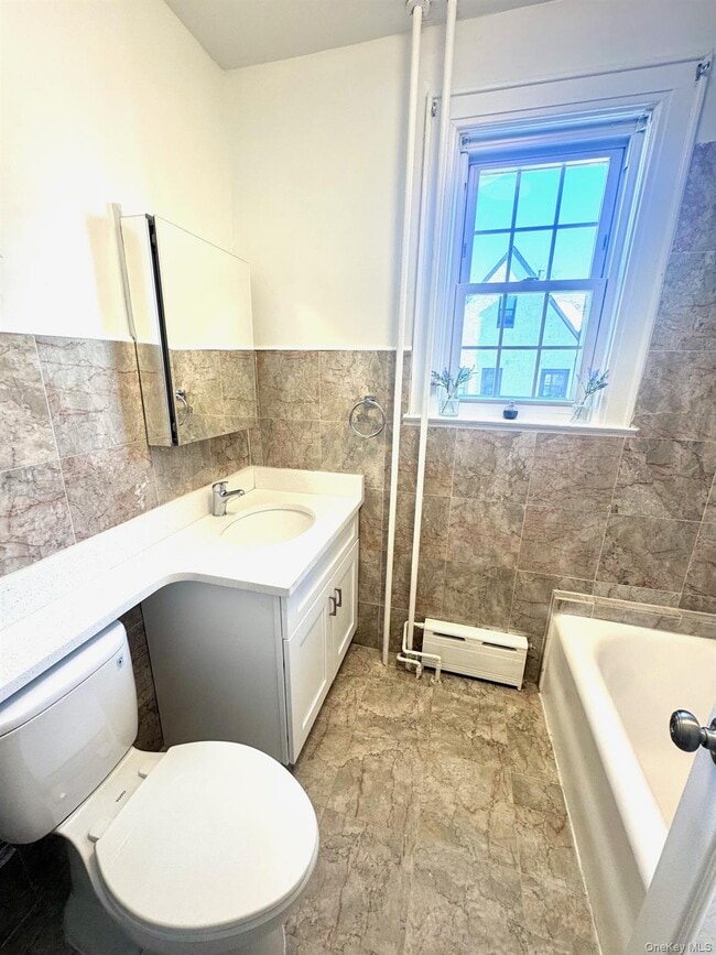 Building Photo - 214-06 36th Ave