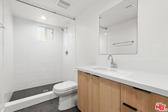 Building Photo - 6941 1/2 Simpson Avenue Unit