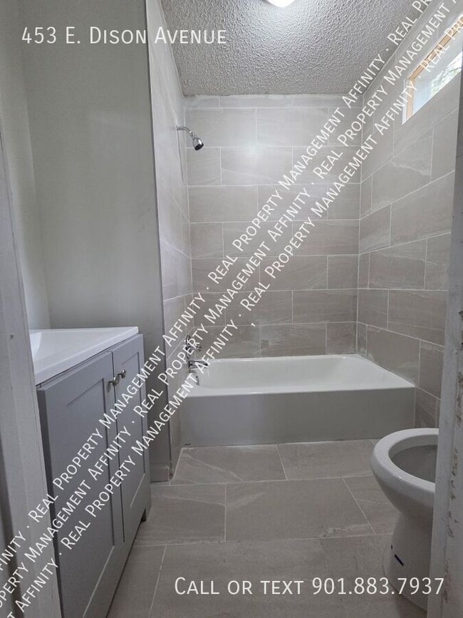 Building Photo - 453 E Dison Ave