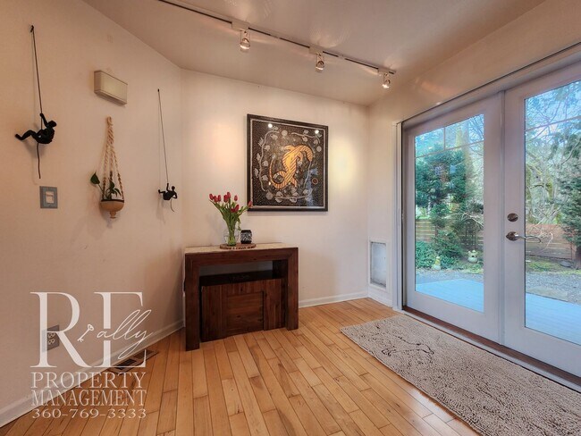 Building Photo - Light-Filled View Home with Vaulted Ceilings & Warm Wood Finishes