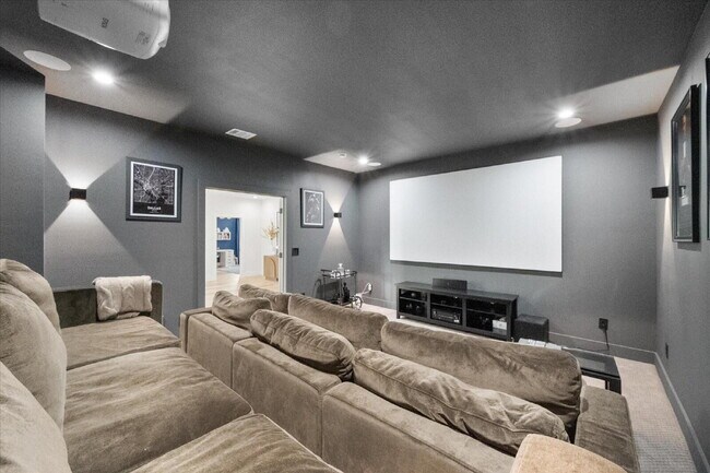 Building Photo - "Luxury 5-bedroom home offering expansive living, upscale design and seamless indoor-outdoor ente...