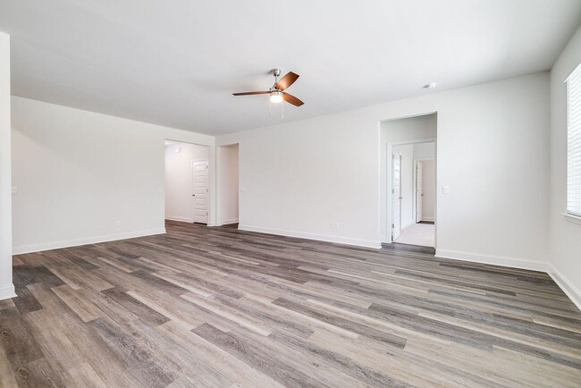 Building Photo - Beautiful 4BR Home in Woodland Trail – Top...