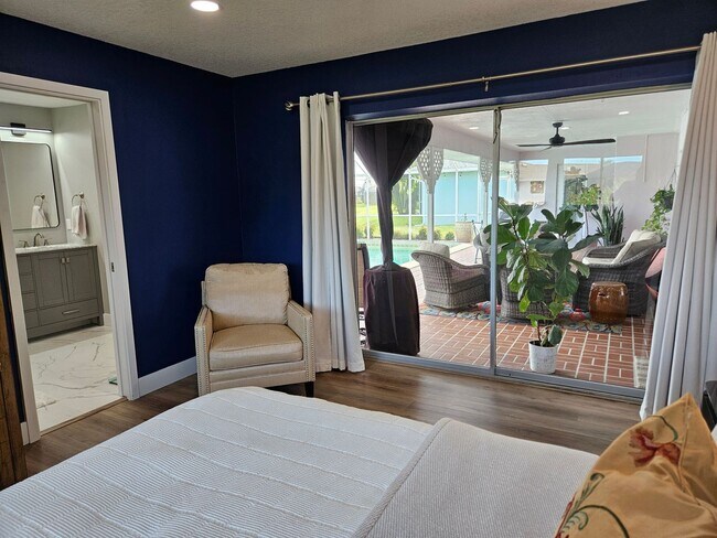Building Photo - Annual Rental or 6+ month option - FURNISHED HEATED POOL HOME. Gorgeous 3 Bedroom, 3 Bath, 2 Car ...