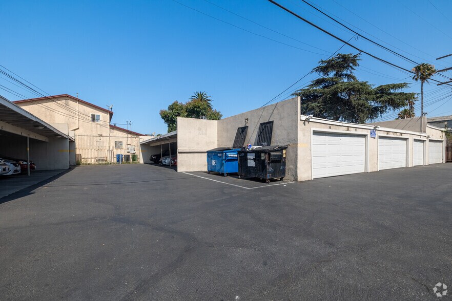 Parking lot - covered - Mid-Century Property Amid South LA’s Vital Commercial Corridor