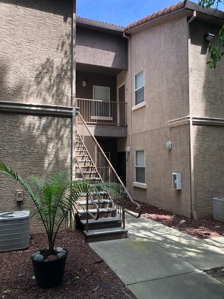 Entry stairs to the upstairs condo - 10001 Woodcreek Oaks Blvd