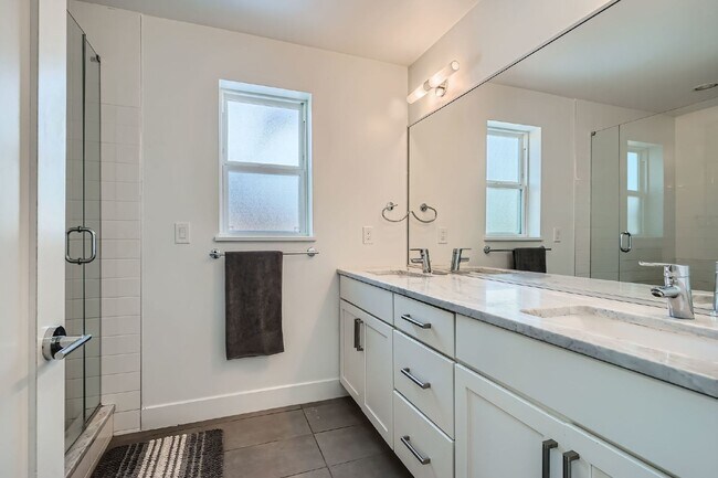 Building Photo - Available NOW! SIX MONTH LEASE - Spacious 3-Bedroom Townhouse with 3.5 Baths in Vibrant Sloans Lake!
