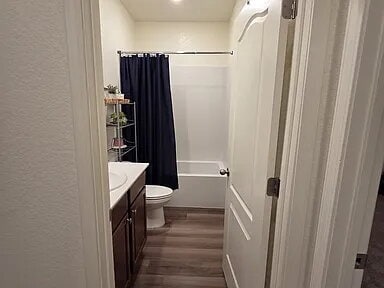 Building Photo - This stunning three-bedroom, two-bathroom home offers an incredible amount of space and upgrades,...