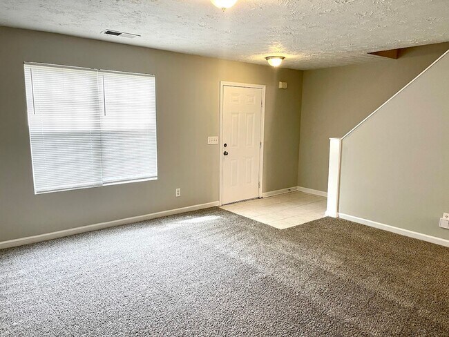 Building Photo - Welcome to this charming 3-bedroom, 2.5-bathroom townhouse located in the vibrant community of Li...