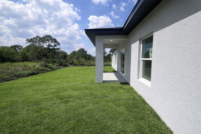 Building Photo - BRAND NEW MODERN SF HOME 3BD+den/2BA with GARAGE IN LEHIGH ACRES!