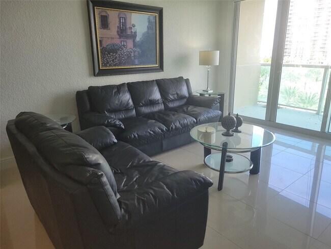 Building Photo - 19370 Collins Ave