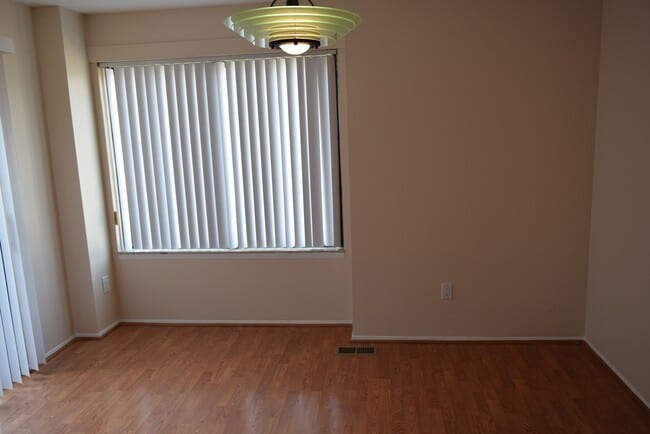 Building Photo - Updated 2-Bedroom Condo with Finished Basement, Garage, Pool, Tennis, Clubhouse