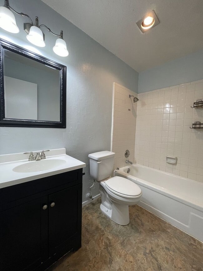Building Photo - Spacious Snyder Home: 3 Beds, 2 Baths, 2-Car Garage & Cozy Carpeted Bedrooms!