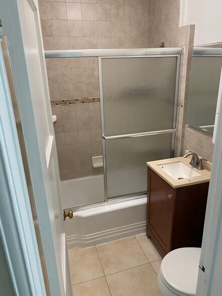 Bathroom also a separate vanity above the toilet - 11280 Morrison St
