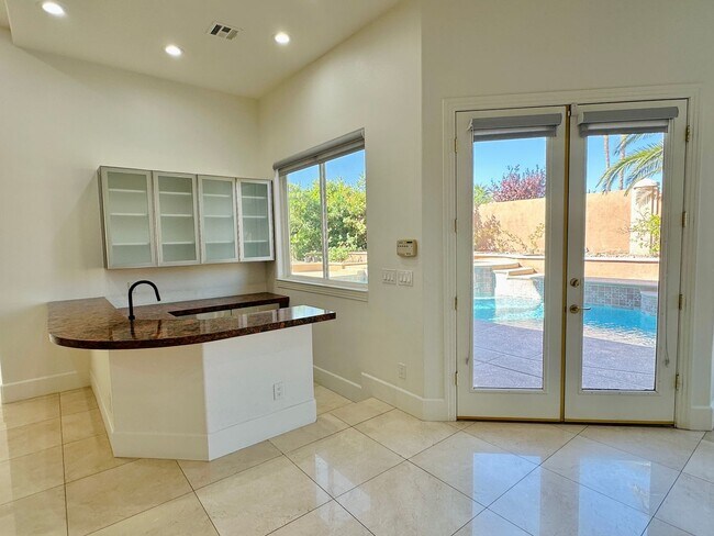 Building Photo - Stunning home with pool in prestigious Eagle Hills!