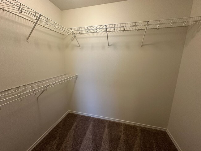 Building Photo - MOVE IN SPECIAL! Spacious 2 bed/2.5 bath with bonus room townhome off Road 68