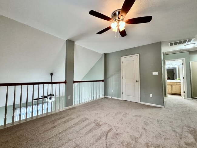Building Photo - READY NOW!! End-Unit Loft-Style Condo w/1s...