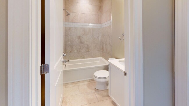 Building Photo - Stunning Three Bedroom Penthouse Condo W/Three Private Outdoor Spaces & Parking Included!