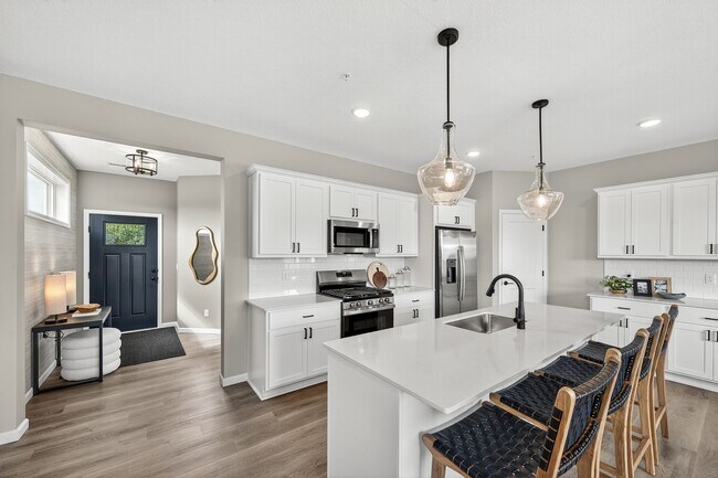 Building Photo - Grandview END UNIT townhome plan in Corcoran’s Hope Meadows community—a brand-new townhome develo...