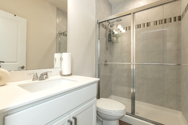 Building Photo - "Discover Spacious Living: 5-Bedroom Craftsman Home in Gated and Amenity-Rich Bretagne with Top-R...
