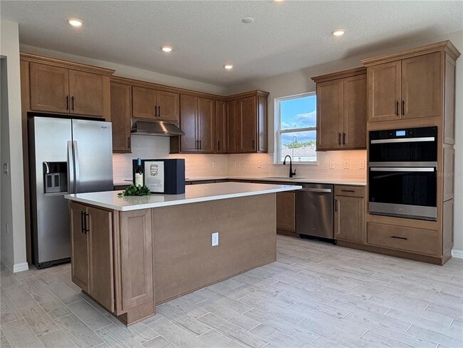 Building Photo - 5648 Flame Vine Wy