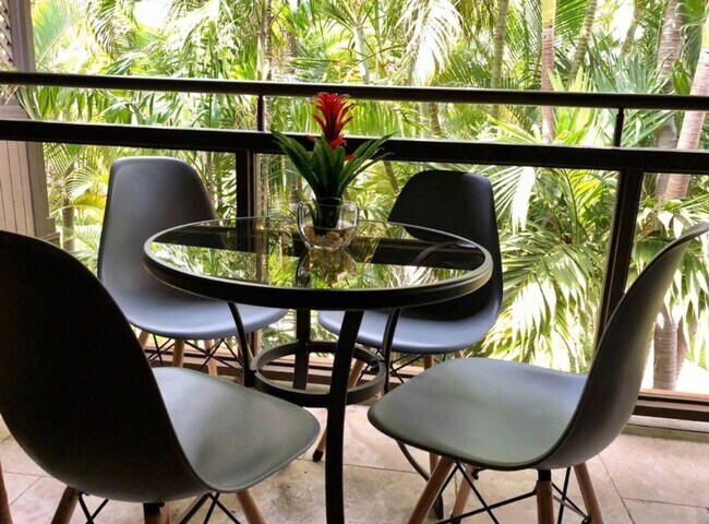 Building Photo - Spacious 2BR/2BA Condo with Garden View – Steps from the Ocean