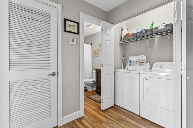 Building Photo - Welcome to Coastal Living at Harbor Landing Condominiums!