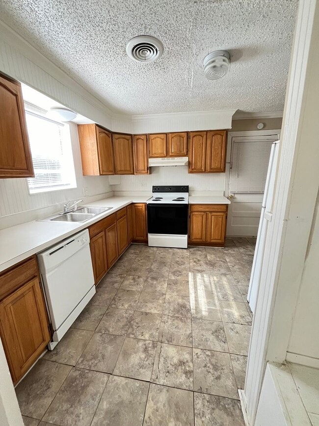 Building Photo - Denton Charmer with Big Yard, Carport & Flexible Living Space